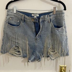 Denim shorts with fringe